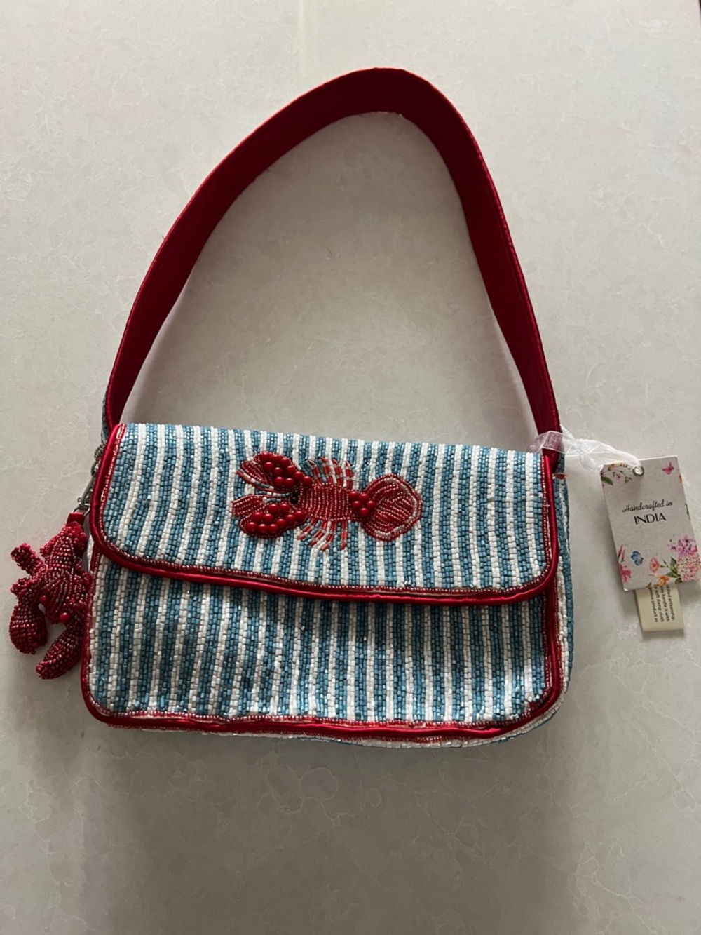 Viral Blue Stripe Shoulder Bag with Red Beaded Lobster Accent